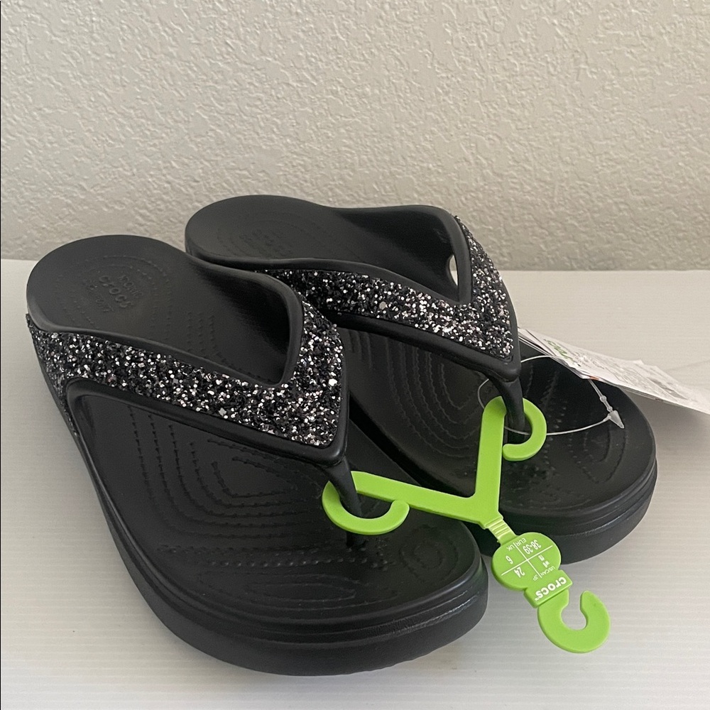 Crocs Women’s Sloane Glitter Flip Flop Wedge Sandals
